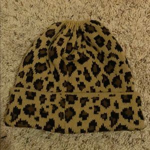 A leopard print bini and it has a pony tail hole